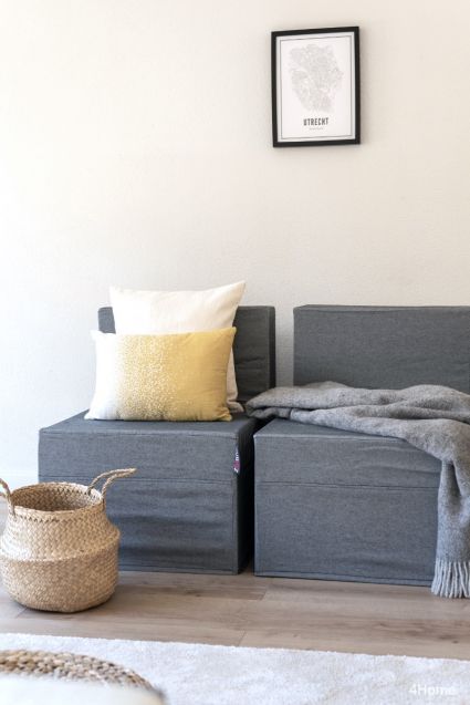 Exklusive Stoffbezüge für Cubiqz-Pappstühle in verschiedenen Farben erhältlich.